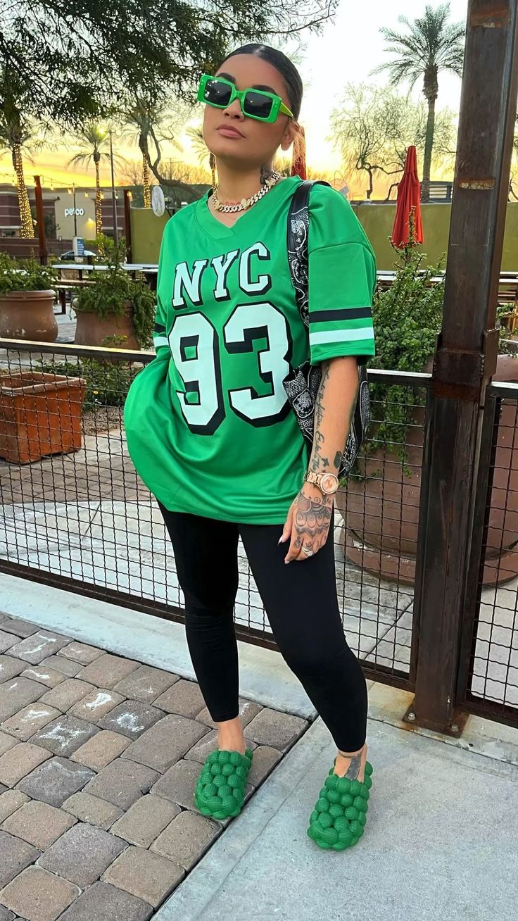 Oversized Jersey with Black Leggings and Green Bubble Slides